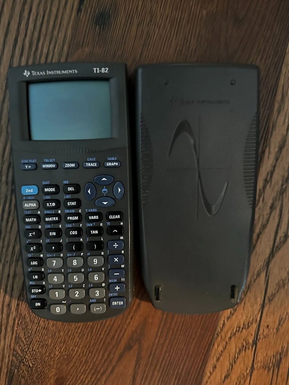 Texas Instruments TI-82 Graphing Calculator with Slide Cover